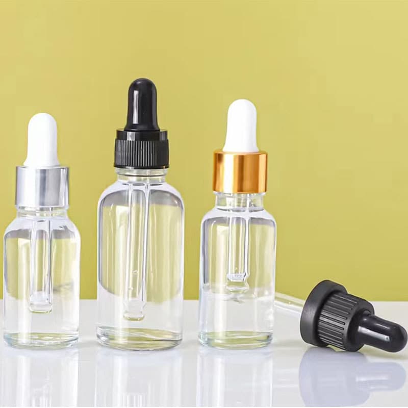 Clear Glass Boston Round Bottles With White Bulb Droppers thumbnail 3