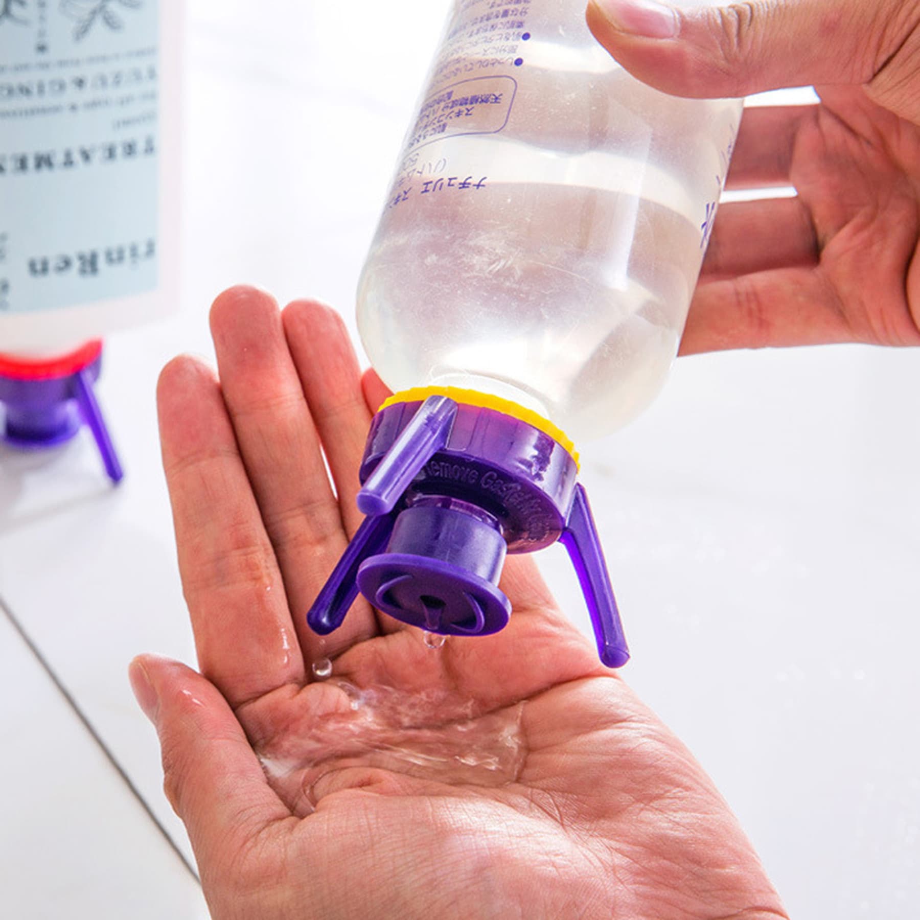 Bottle emptying cap